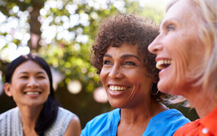 Three women laughing